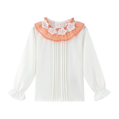 set de falda floreada y blusa blanca
