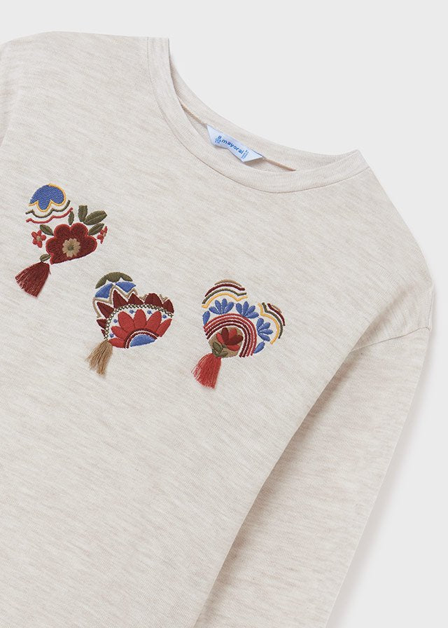 set blusa milk 3 corazones, falda de flores granate, mayoral