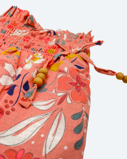 conjunto coral floreado y pantalon bombacho