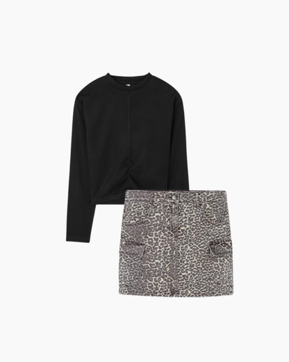 Conjunto sweater negro y falda a cuadros