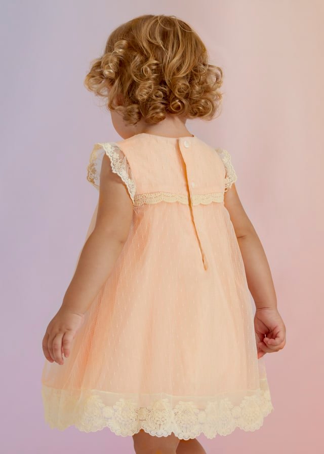 Vestido de lino de bebé con estampado de flores y con cubre pañal a juego