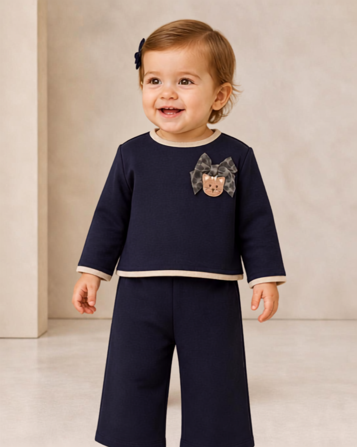 Conjunto pantalón y jersey bordado